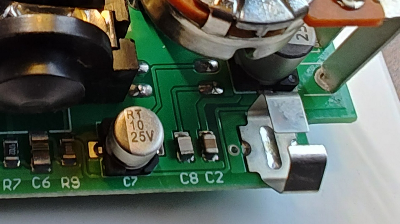 Photo of the Harwin S1941-46R multi-dimensional spring contact on the side of a Keeley Mini Katana circuit board.